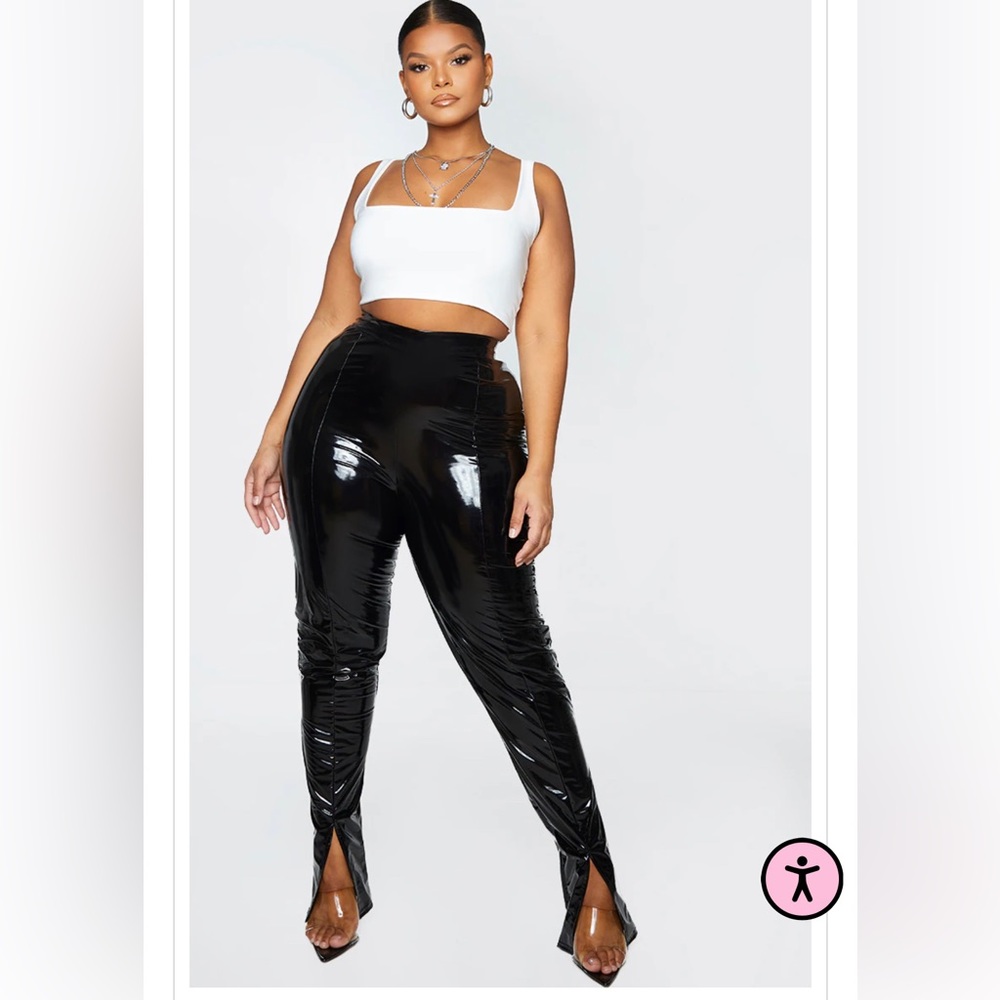 Black vinyl split hem trousers
